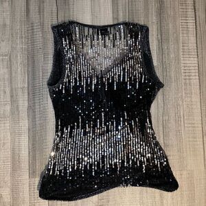 Frederick’s of Hollywood sparkly black & silver top w/ a V neck & sequin details